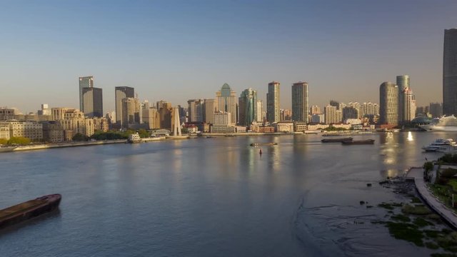 China Shanghai Aerial v43 Hyperlapse flying low over Huangpu river with boats toward Waibaidu bridge 10/18