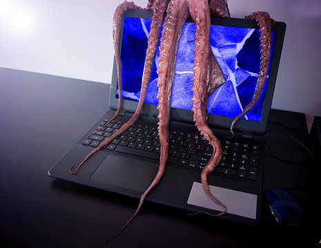 Computer virus concept. Laptop infected by malicious software.