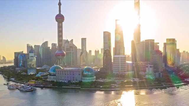 China Shanghai Aerial v44 Hyperlapse flying around landmark waterfront, financial center, with sunlight glare 10/18