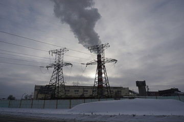 Power line towers, CHP pipe with smoke