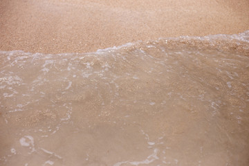 Fototapeta premium A onda e a areia