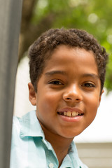 Naklejka premium Portarit of a young mixed race little boy.