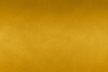 Fototapeta premium Luxury gold textile background. Silk cloth texture. Fabric pattern.
