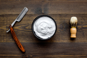 barbershop desk with tools for male care wooden background top view