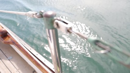Lifeguard with american Flag florida beachFlorida Beach with people lifeguard houses umbrellas afternoon lighting american flag calm ocean A LIFEGUARD STATION WITH GREEN FLAG ON THE BEACH - Powered by Adobe