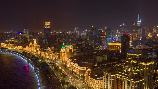 China Shanghai Aerial v51 Hyperlapse at night, birdseye high to low over river to cityscape views 10/18