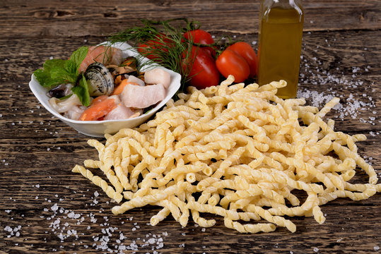 Raw busiate with fish dressing  