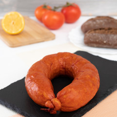 smoked sausages on a black background