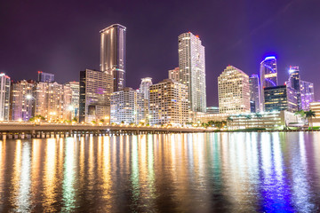Fototapeta na wymiar Miami downtown skyline under bright night lights