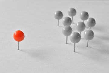 Push pins on a white background

