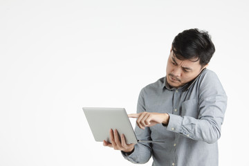 asian young man using digital devices