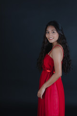 young beautiful Asian woman in red dress