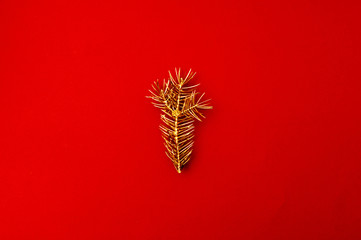 Creative pattern with golden Christmas tree branch. Concept