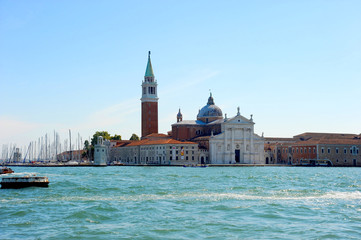 Fototapeta na wymiar Traveling on the Grand Canal in Venice and seeing all the historical landmarks.