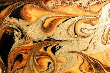 Gold marbling texture design.Golden marble pattern. Fluid art.