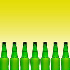 Bottles of beer on a light background. Copy space