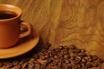 Cup of coffee on a wooden table