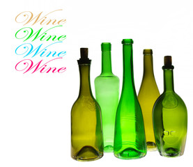 Colored wine bottles on white. Isolated on white
