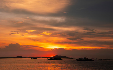 Sunset at the sea withcloud scape background