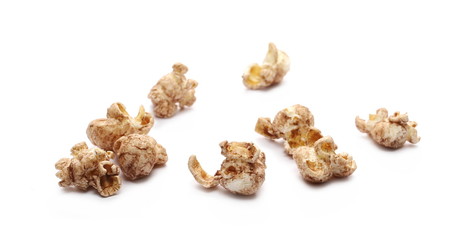 Chocolate flavored popcorn isolated on white background
