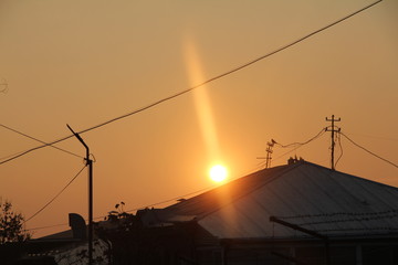 wind turbines at sunset