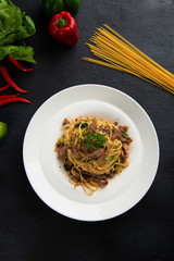 spaghetti with iberico pork flat lay view