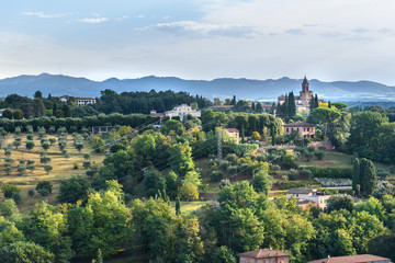 Obraz premium View from city wall with beautiful landscape and Basilica dell'Osservanza. Siena. Italy