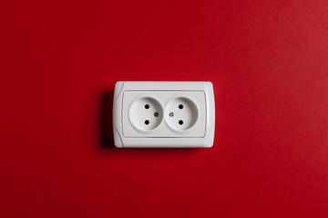 socket on red wall