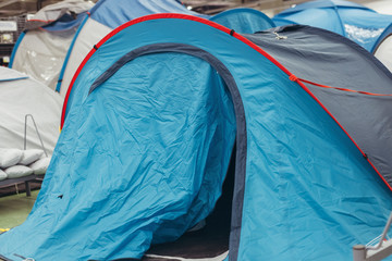 Sale of modern tourist tents in shop