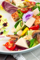 Chisken breast and mushroom salad with vegetables