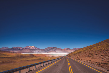 Asphalt road through the Atacama desert, Chile