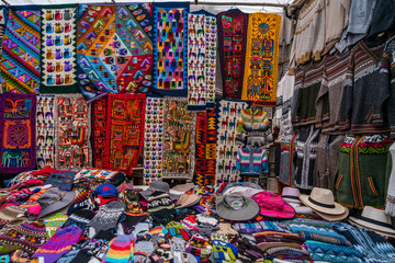 Peruvian shop with handmade hats and scarfs - obrazy, fototapety, plakaty