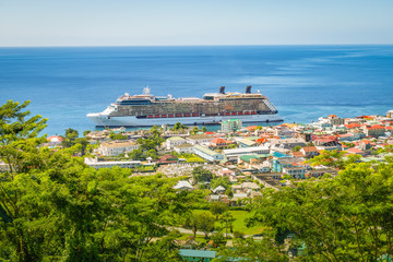 Roseau, Dominica with cruise ship in the harbor.