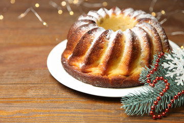 Christmas cake and fir branch