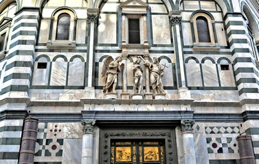 Fototapeta na wymiar The Baptistery is one of the oldest buildings in Florence Italy. 4th century. Iconic octagonal basilica with striking marble facade, known for its bronze doors and mosaic ceiling. Italy, Florence