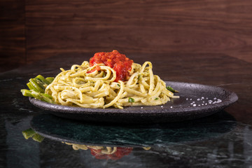 Italian paste made from whole grains of durum wheat. Tomato sauce with meat and vegetables.