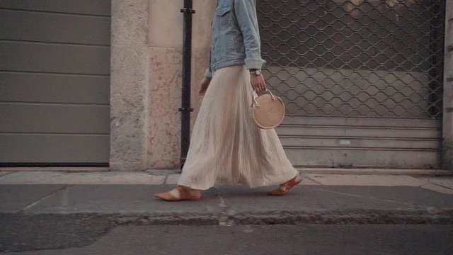Woman in a long skirt in Europe close up