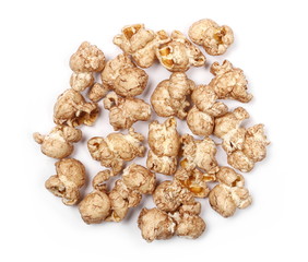 Chocolate flavored popcorn isolated on white background, top view