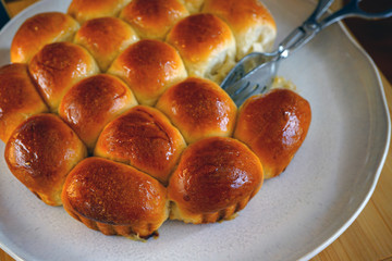Plate of round German Buchteln filled brioche buns