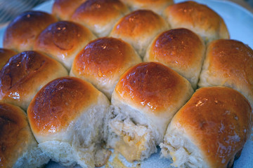 Plate of round German Buchteln filled brioche buns