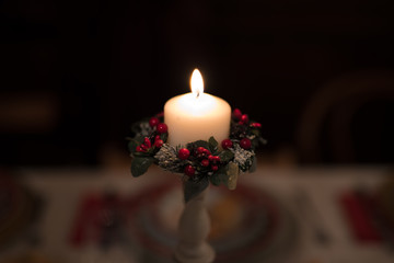 christmas candle on red background