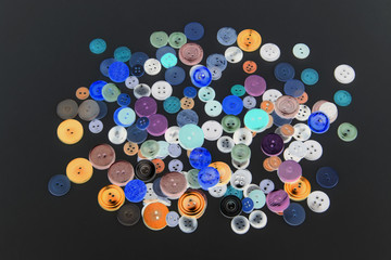 Collection of different buttons for clothes repair. Abstraction.