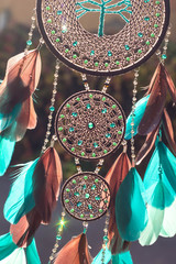 Handmade dream catcher with feathers threads and beads rope hanging