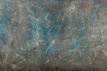 Blue-gray textural background.