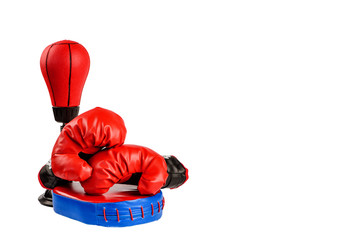 Red boxing gloves with dollar bills on a white background.