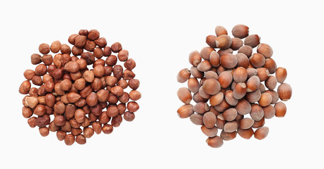 Piles of hazelnuts isolated over white background