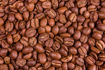 Background of many roasted coffee beans