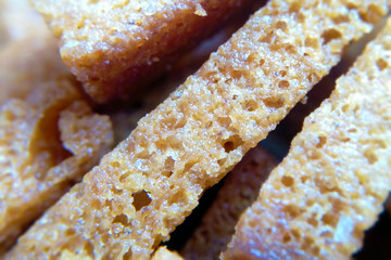 Crackers fried macro blurred out of focus, simple but tasty appetizing dish
