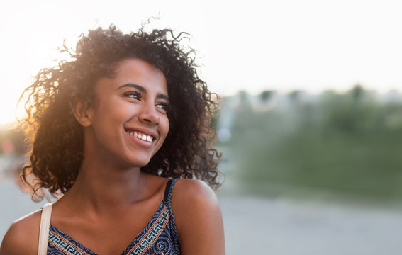 Outdoor portrait of smiling african american girl