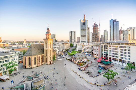 Lutheran church and modern downtown with skyscrapers in Frankfurt upon Main, Germany